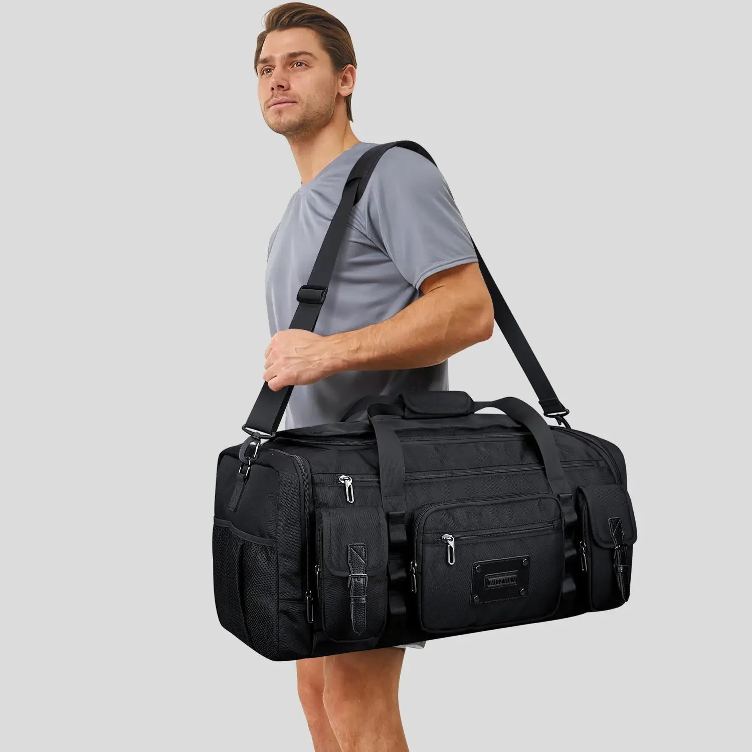 WITZMAN 54L black travel duffel bag for men with shoe compartment and wet-dry pocket shoulder strap